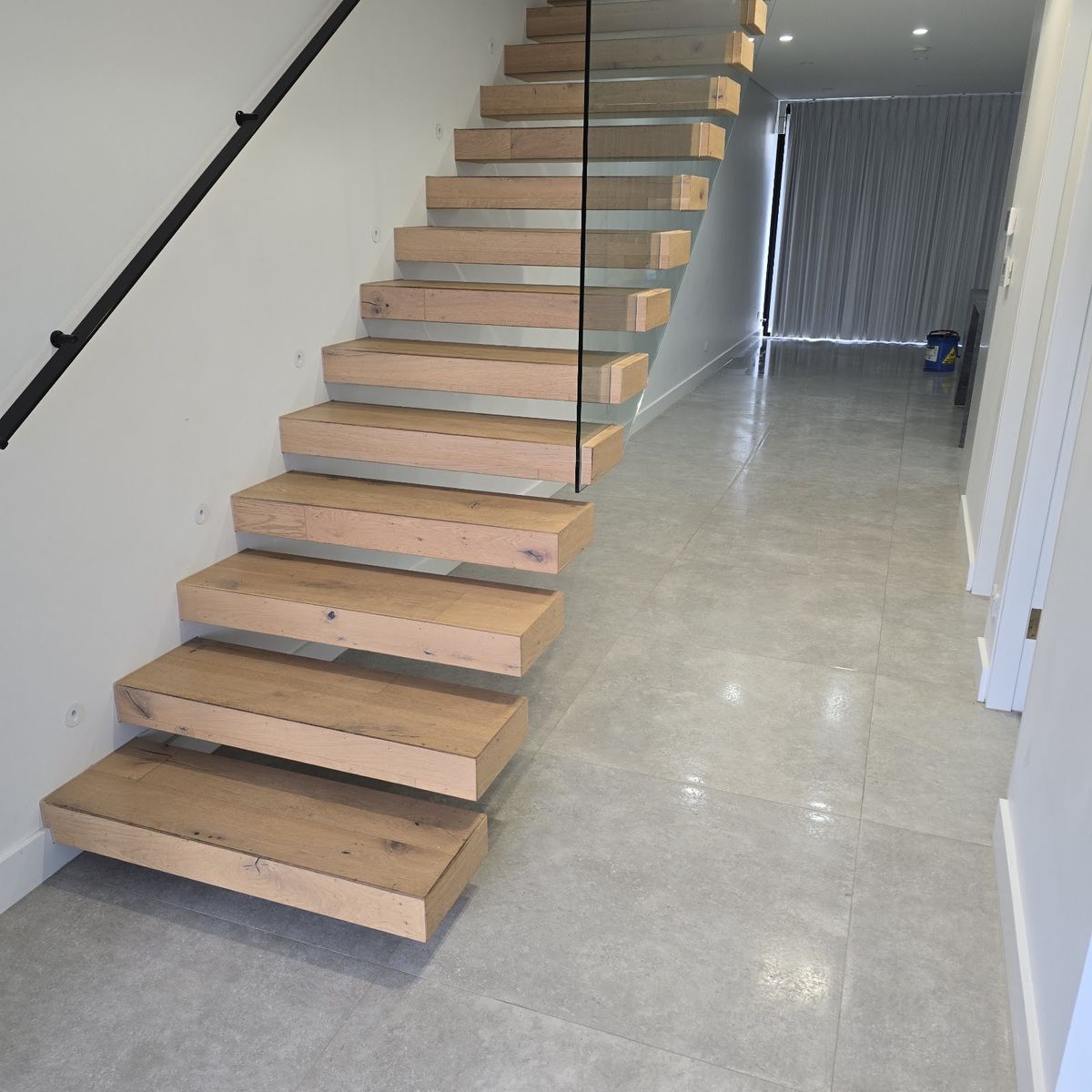 Timber stairs and polished floor cleaned for a bond inspection